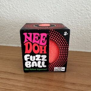 Needoh fuzzball in orange